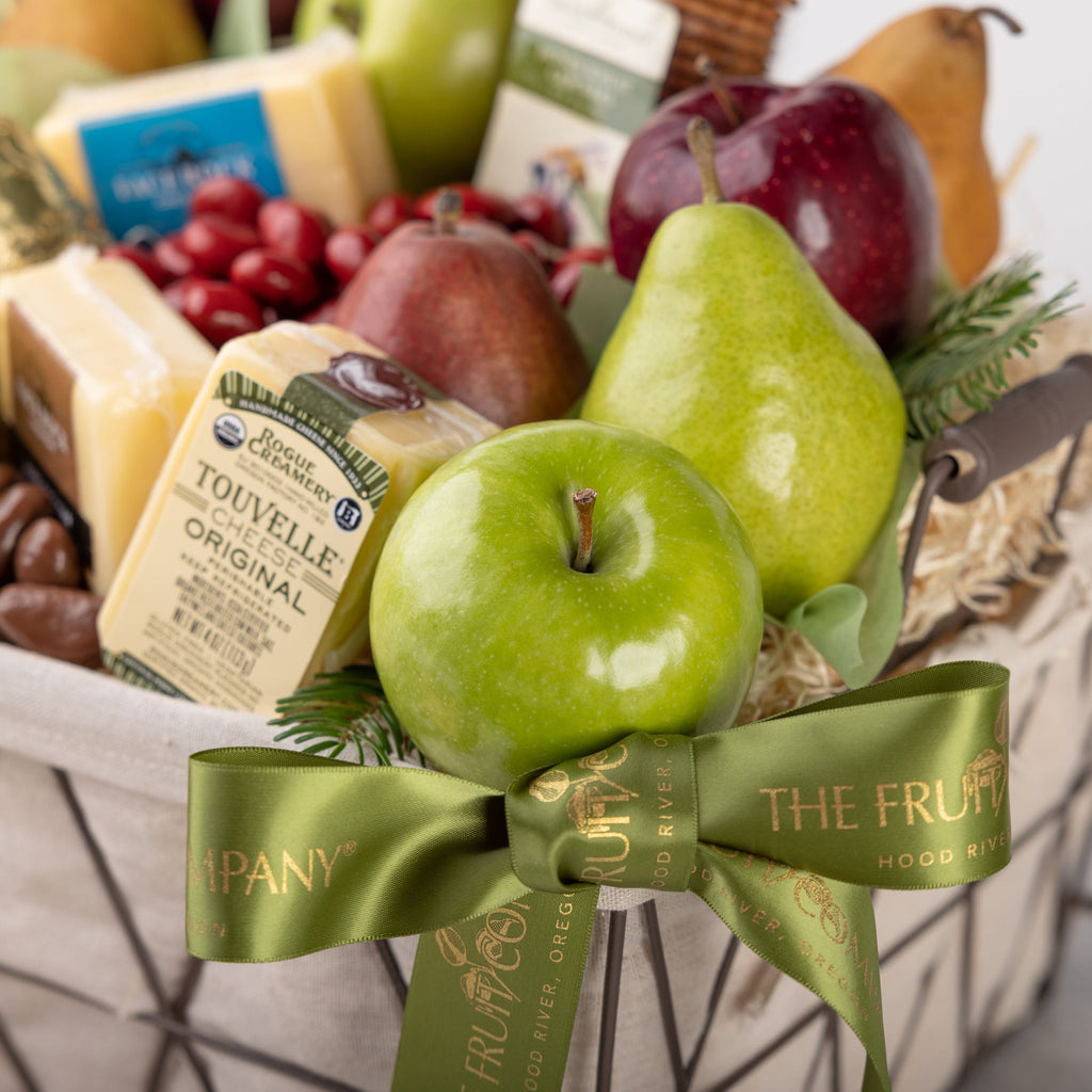 Tight shot of glossy green apples and pears