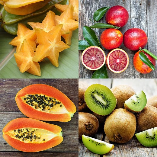 Exotic fruits - star fruit, blood oranges, kiwi and strawberry papaya